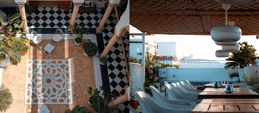 Courtyard view of Dar Shaan with black-and-white tiled floors, potted plants, and elegant column details.