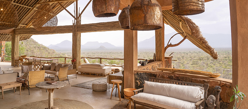 Open-air lounge at Reteti House with sweeping views across Samburu wilderness.