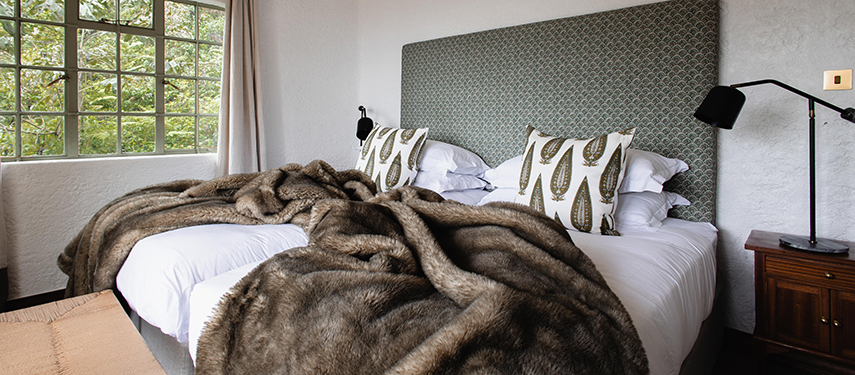 Sumptuous colonial-style double suite at Sabyinyo Lodge, Volcanoes National Park, Rwanda