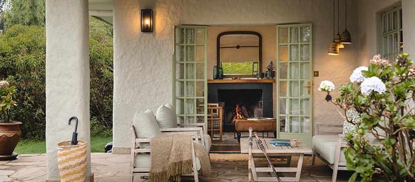 Elegant guest rooms overlook the surrounding mountains of the Volcanoes National Park