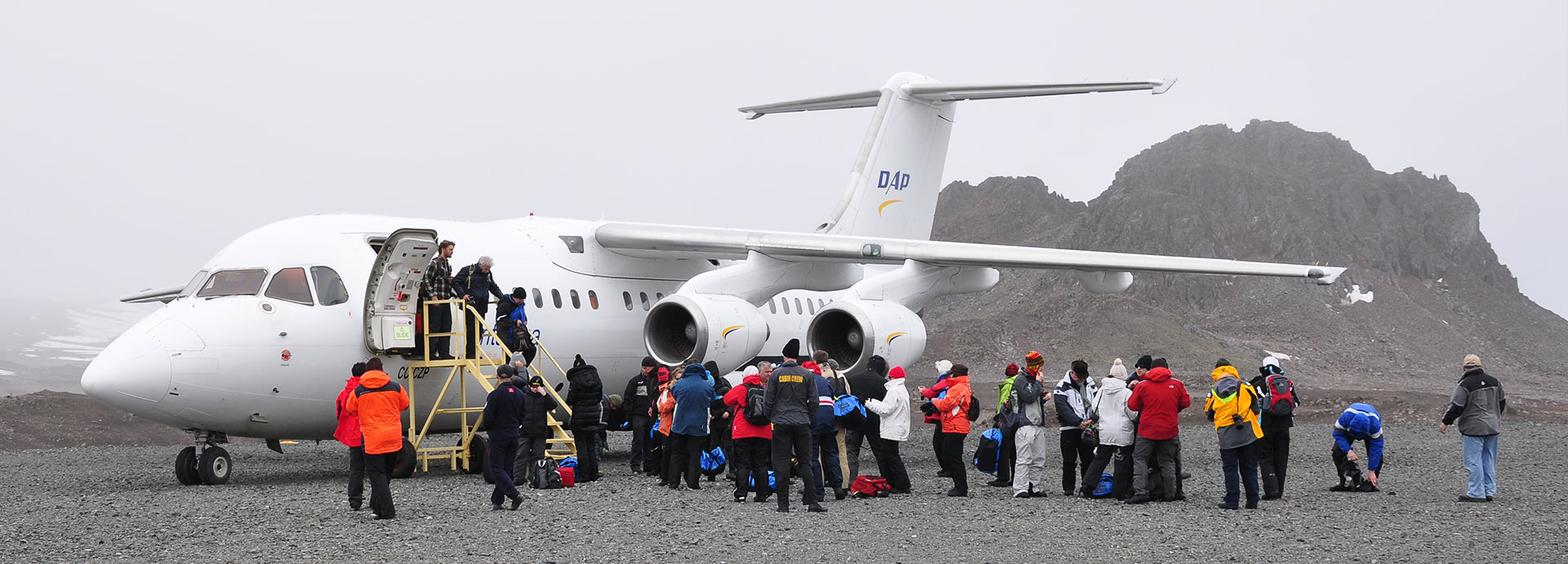 Tourists boarding a plane as part of an Antarctic luxury cruise