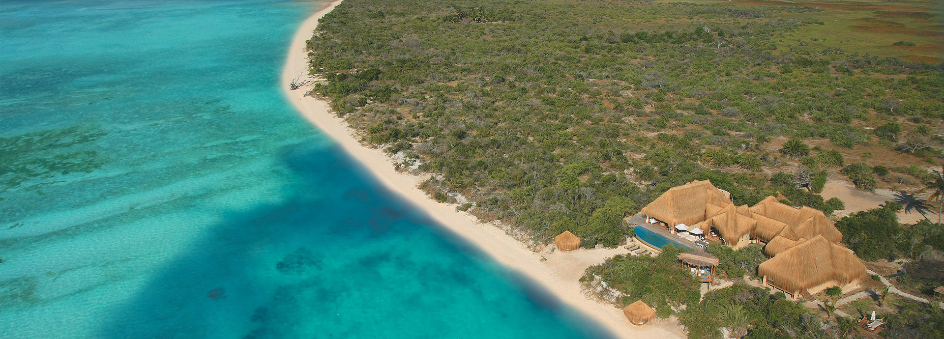 Aerial view of Azura Benguerra located right on the water on a small archipelago in Mozambique
