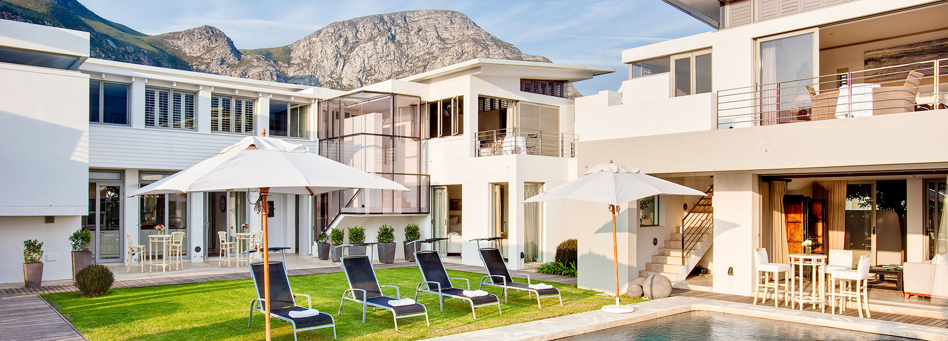 Relax by the pool and enjoy mountain views at Birkenhead Villa in Hermanus, South Africa
