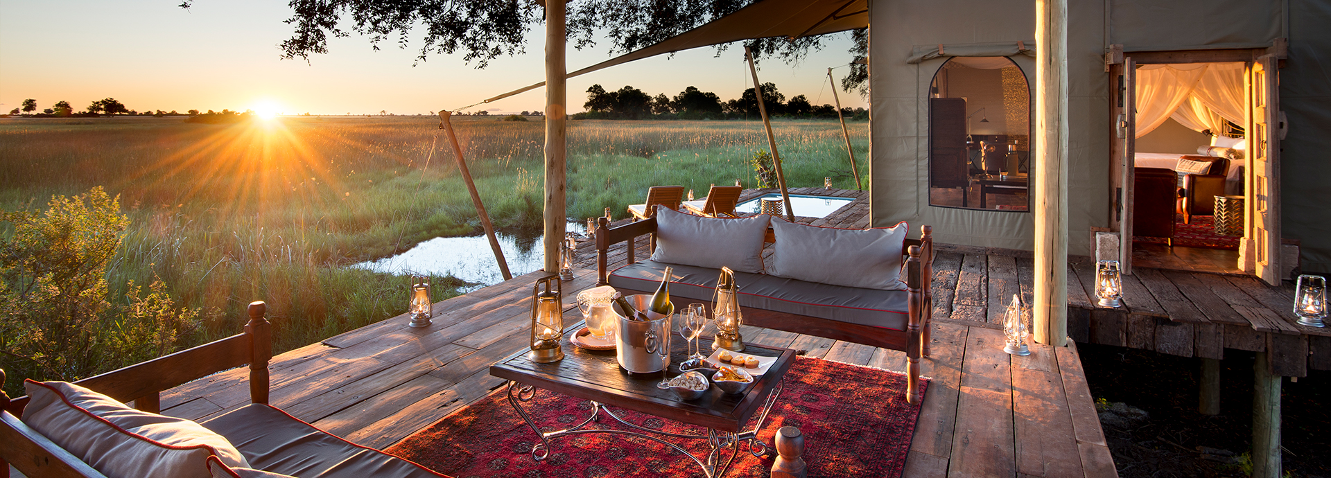 Watch the sun set over the Delta at Duba Plains