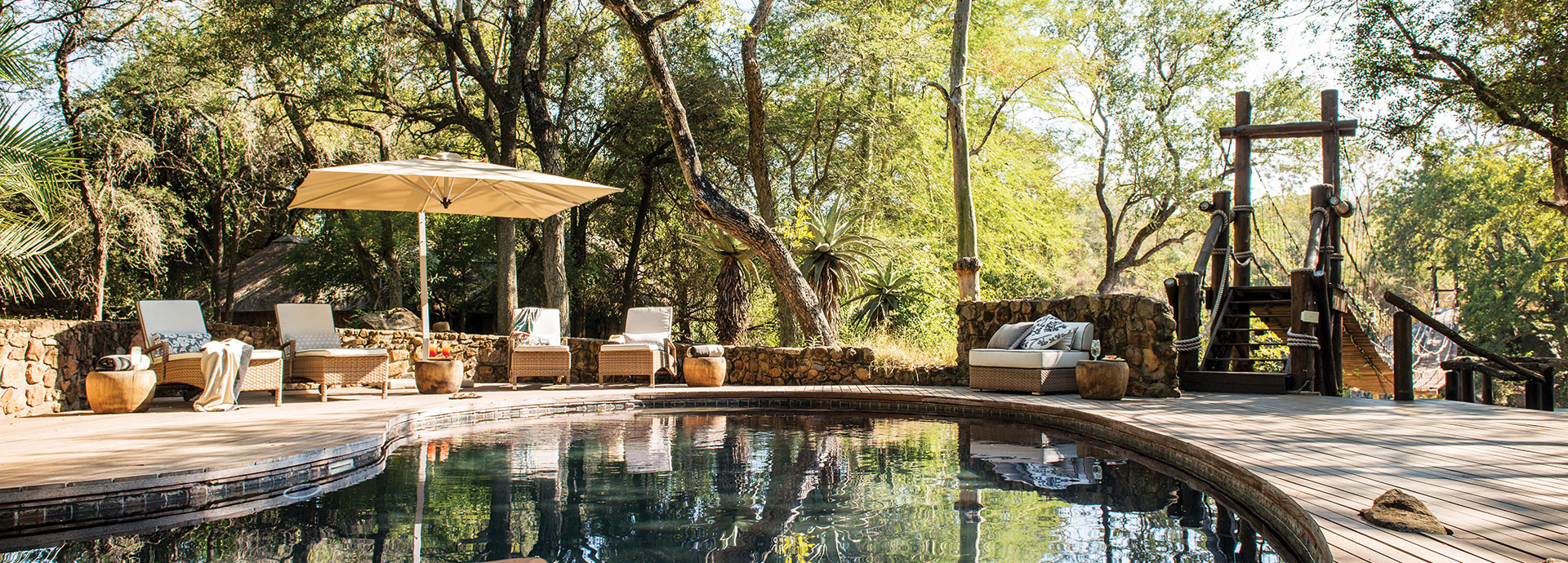 Cool down from the afternoon heat by taking a dip in the pool at Dulini Lodge