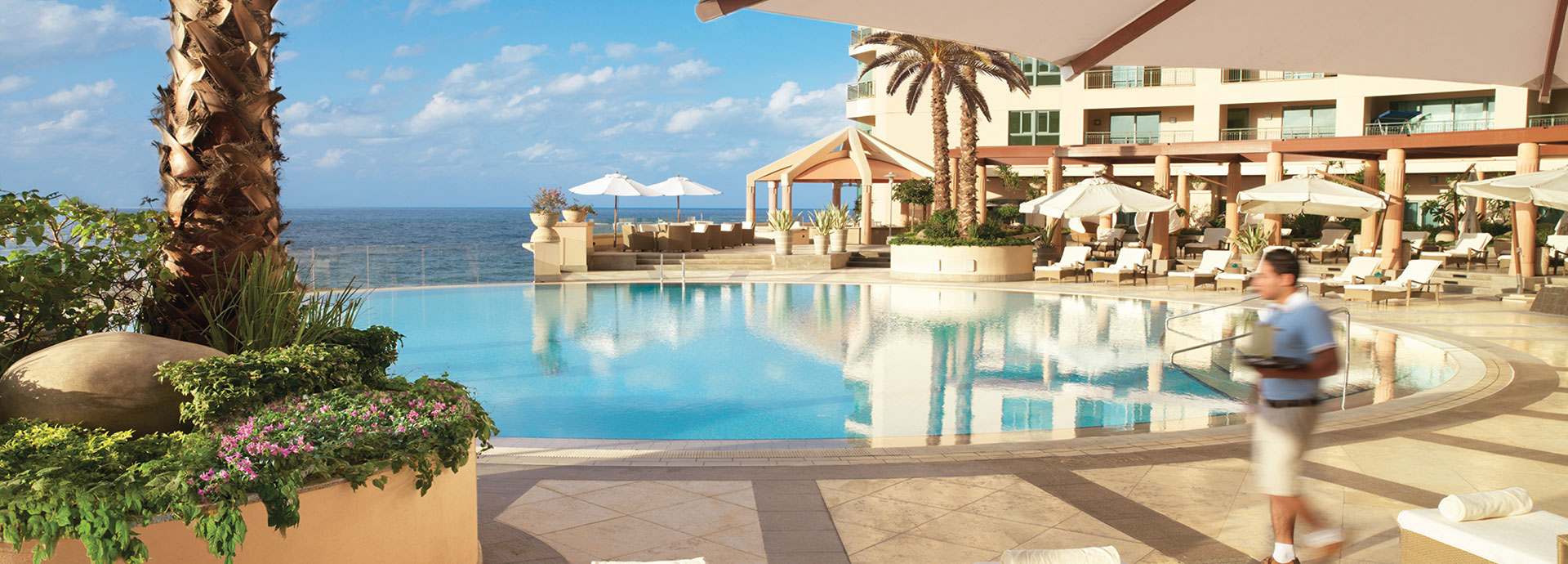 Views of the buzzing metropolis from the pool at Four Seasons San Stefano Alexandria