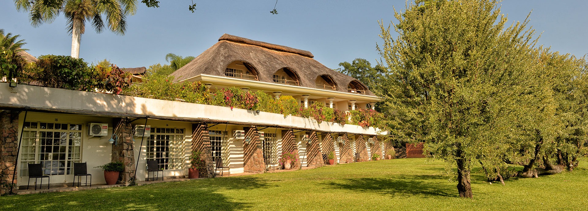 Accommodation with double French doors near the Victoria Falls at Ilala Lodge