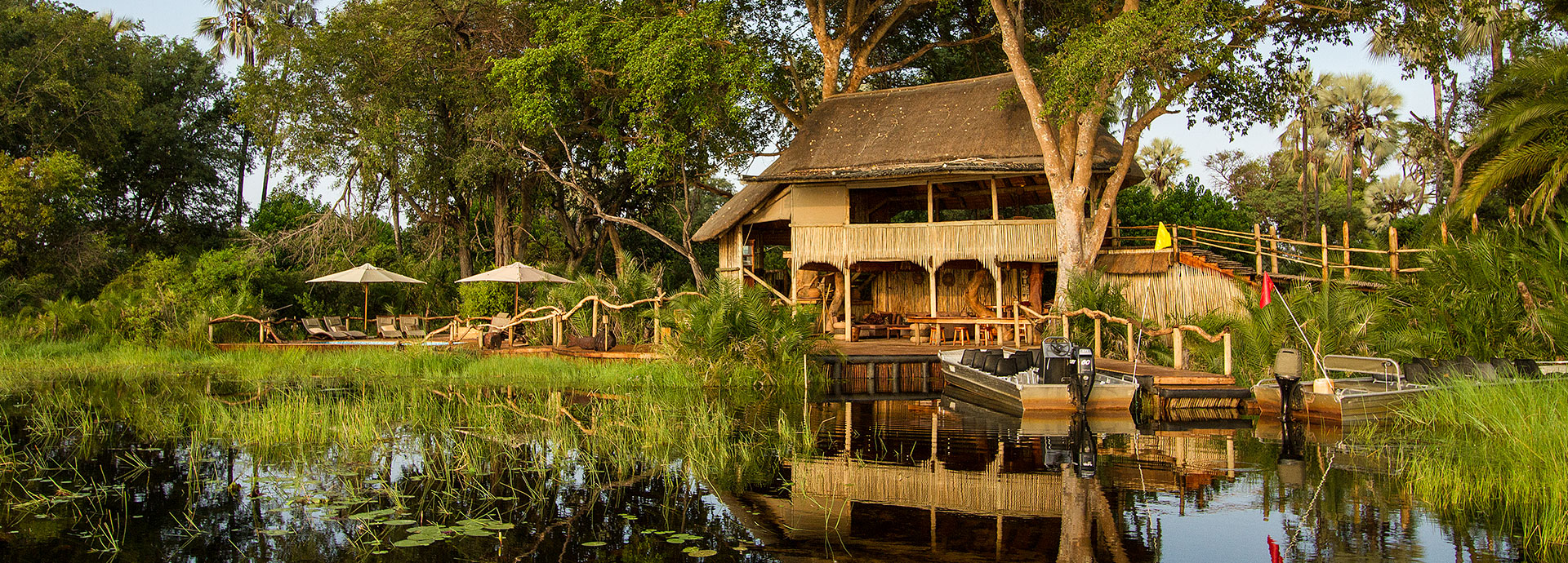Glide along the water channels and lagoons on mokoro at Jacana Camp