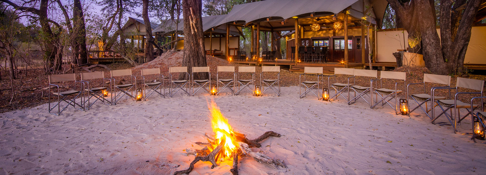 Circle in together for campfire stories at Kwando Kwara