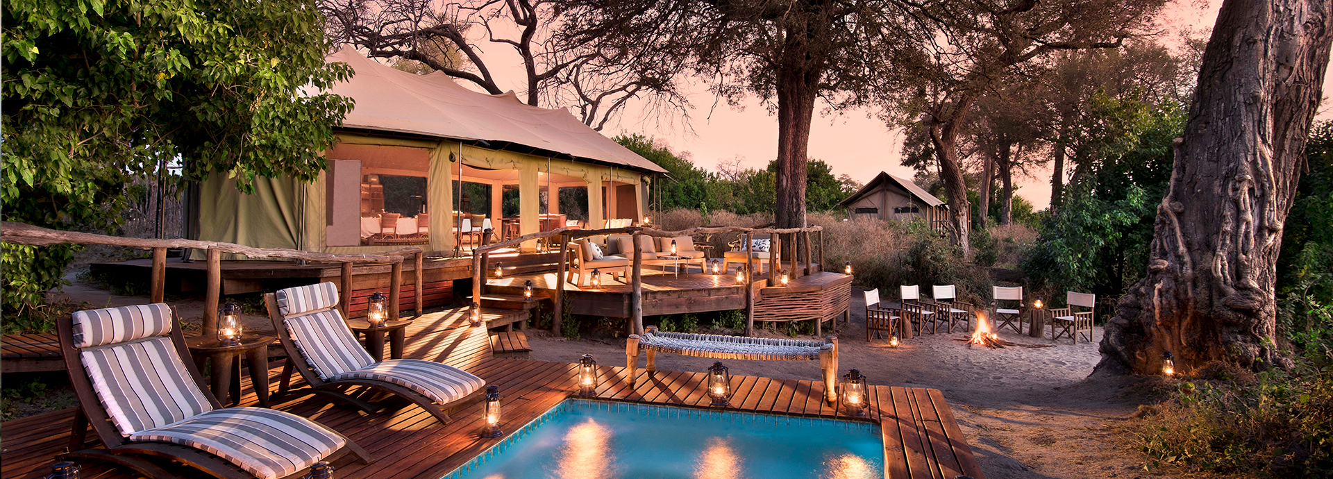 A relaxed pool setting amongst the trees at Linyanti Ebony Camp