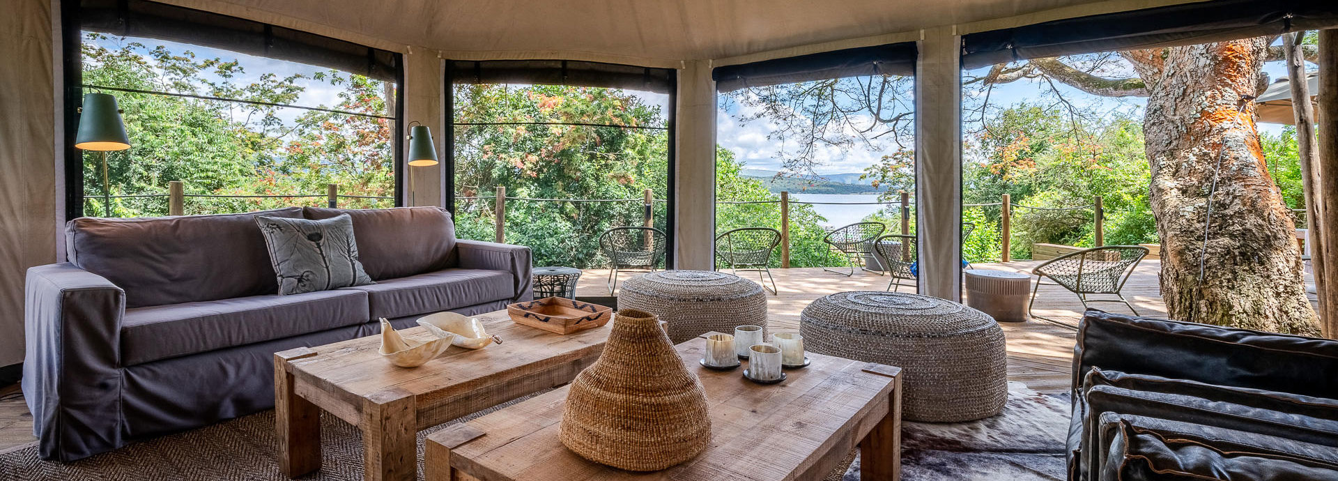 Comfortable living area with lake views at Magashi Camp, Rwanda