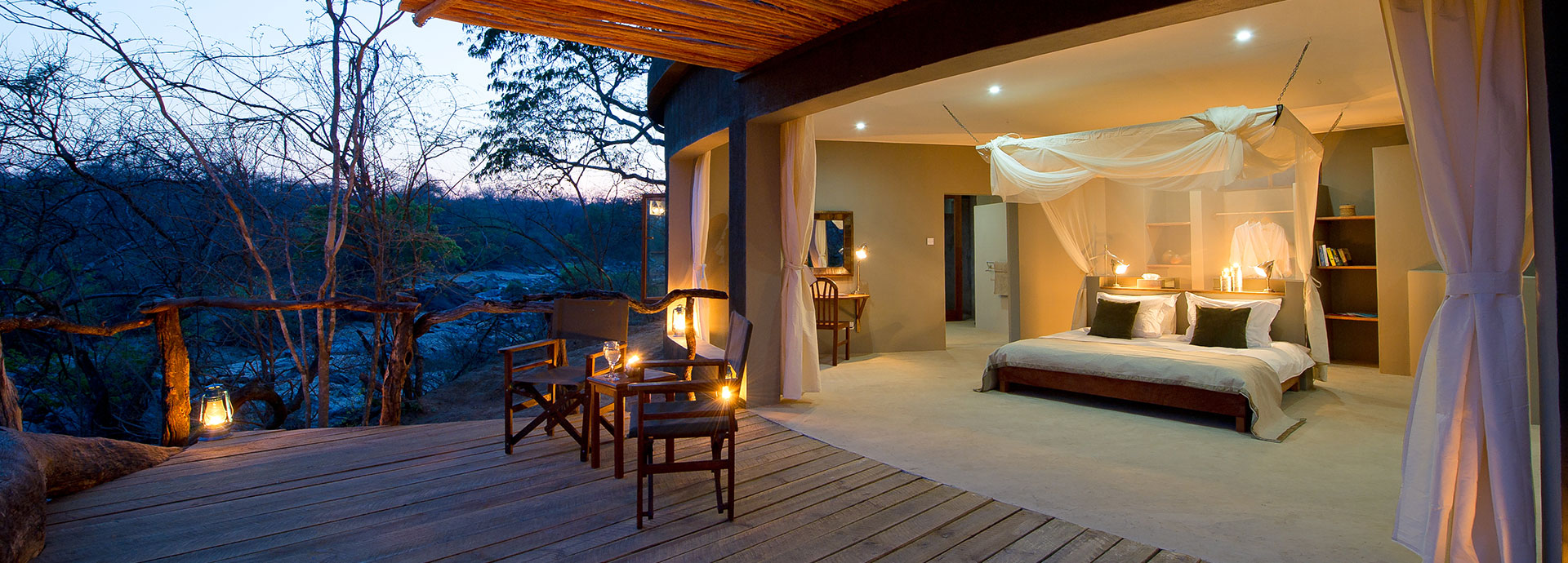 Chalets overlooking the river in the Majete Wildlife reserve at Mkulumadzi