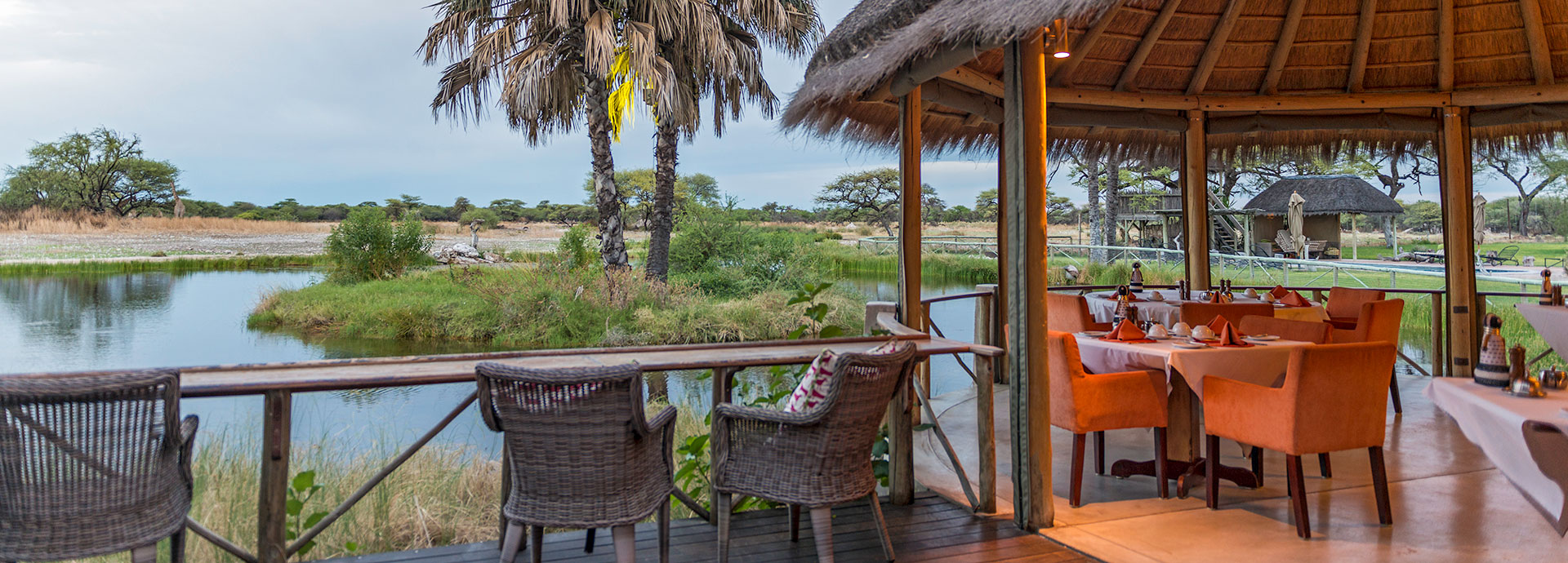 Views of an extensive waterhole and the wildlife it attracts can be enjoyed from the deck at Onguma Bush Camp