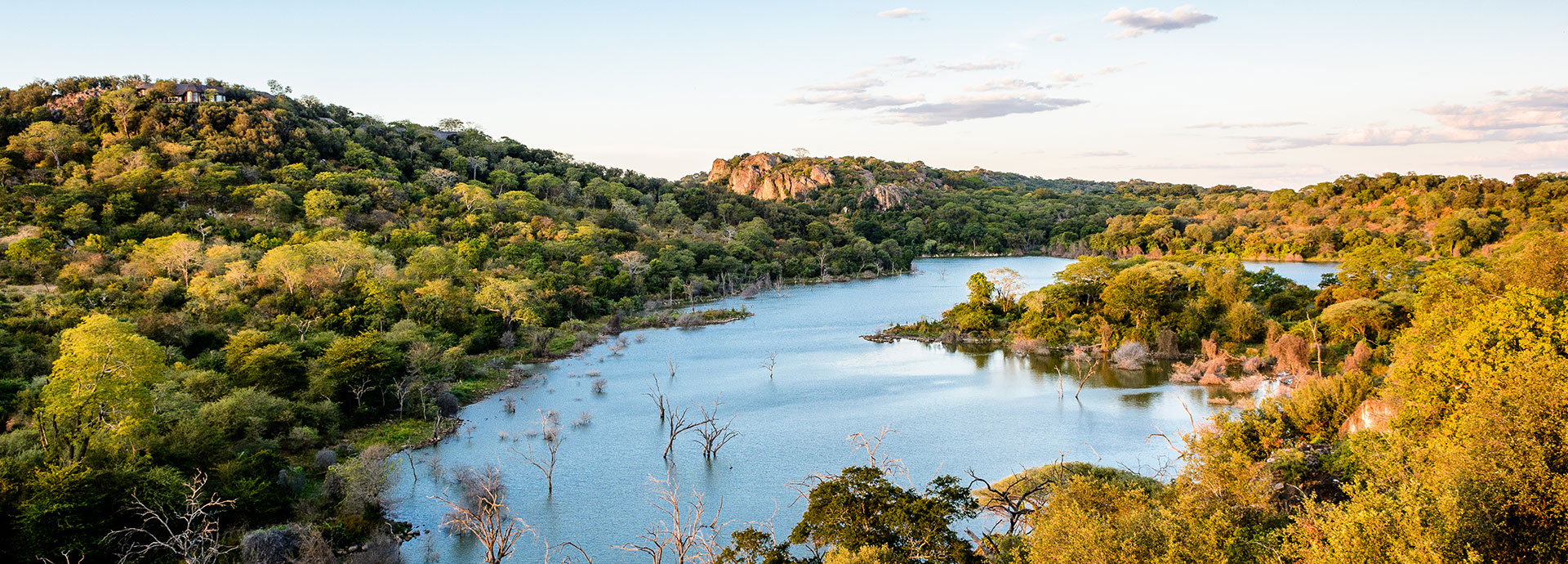The shimmering Malilangwe lake, admired from Singita Pamushana