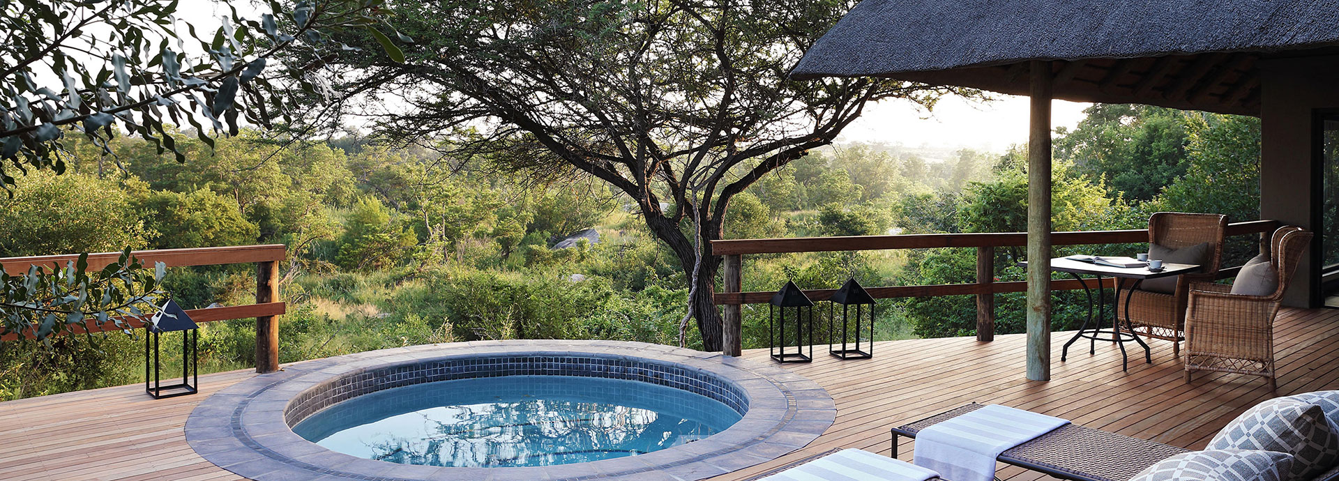 Views across the tops of trees from the spa and deck at Londolozi Pioneer Camp