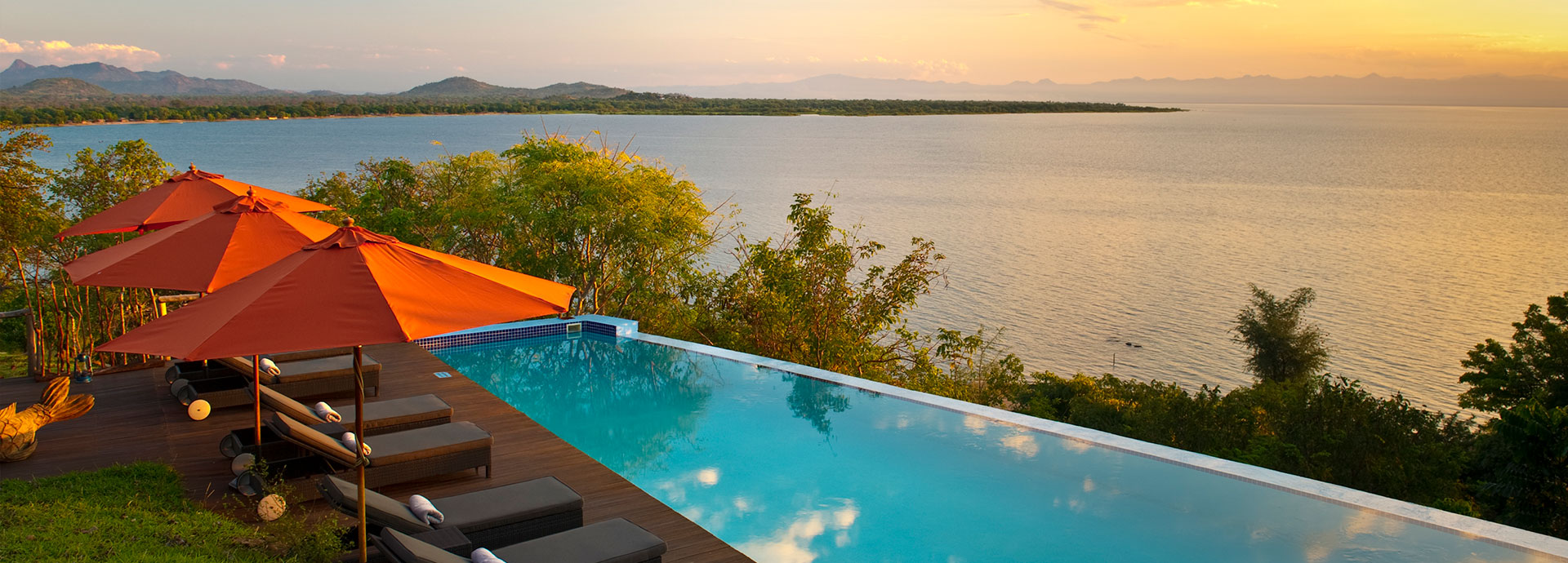 Dip into the infinity pool with views over Lake Malawi at Pumulani