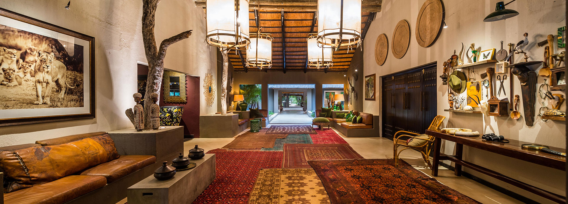 Cozy up on the sofa and share safari stories at Sabi Sabi Bush Lodge