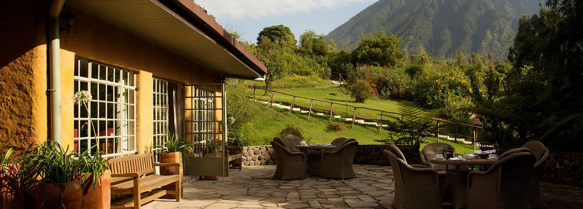 Elegant guest rooms overlook the surrounding mountains of the Volcanoes National Park