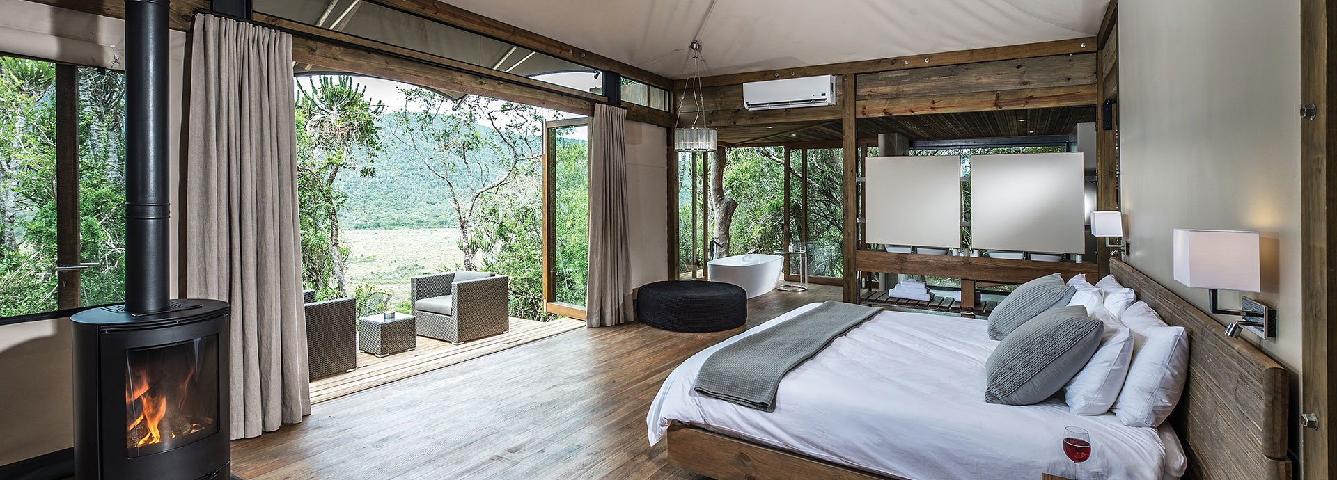 A fireplace and stunning views over the Kariega Private Game Reserve at Settlers Drift