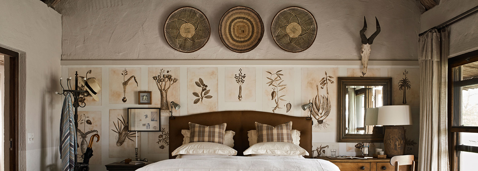Modern and authentic bedroom interiors at Singita Castleton in South Africa