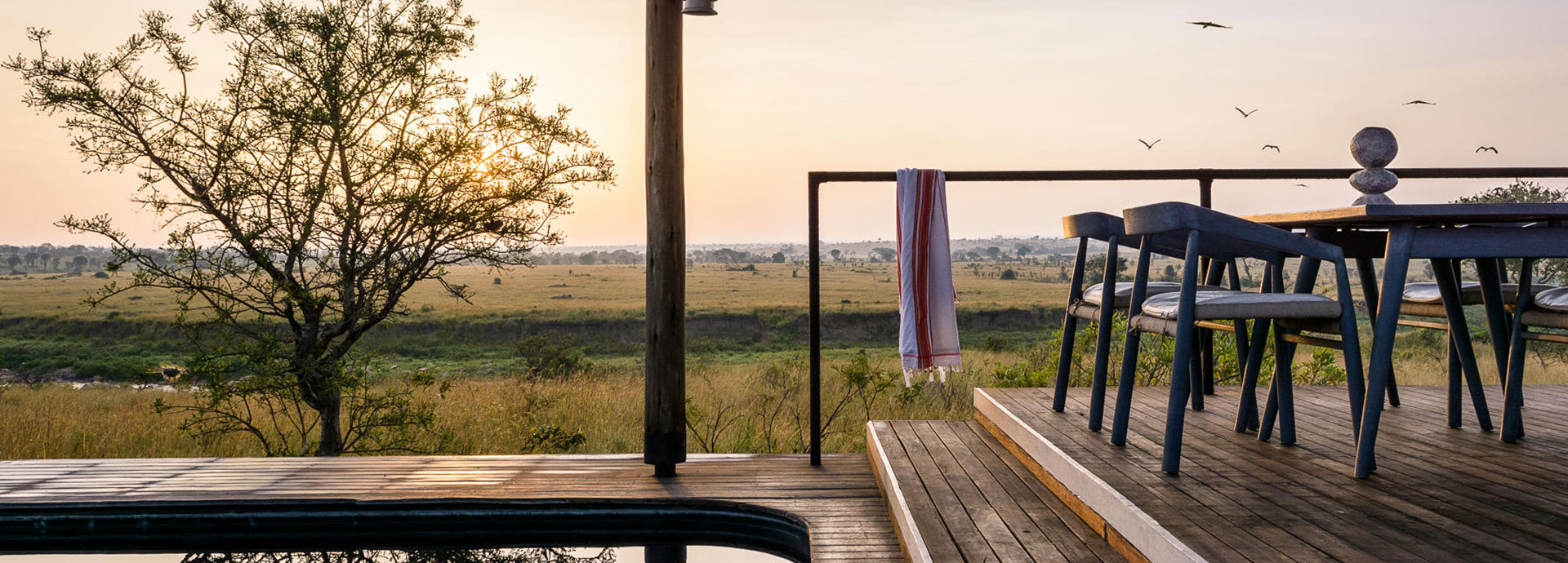 Sunset and sunrise over the plains at Singita Mara Tented Camp
