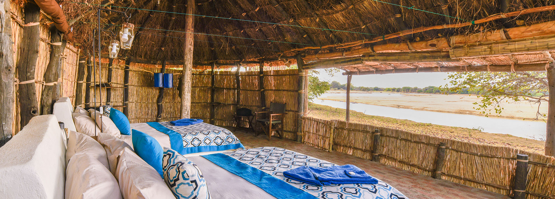 Open air game viewing opportunities beneath a thatched roof at Takwela