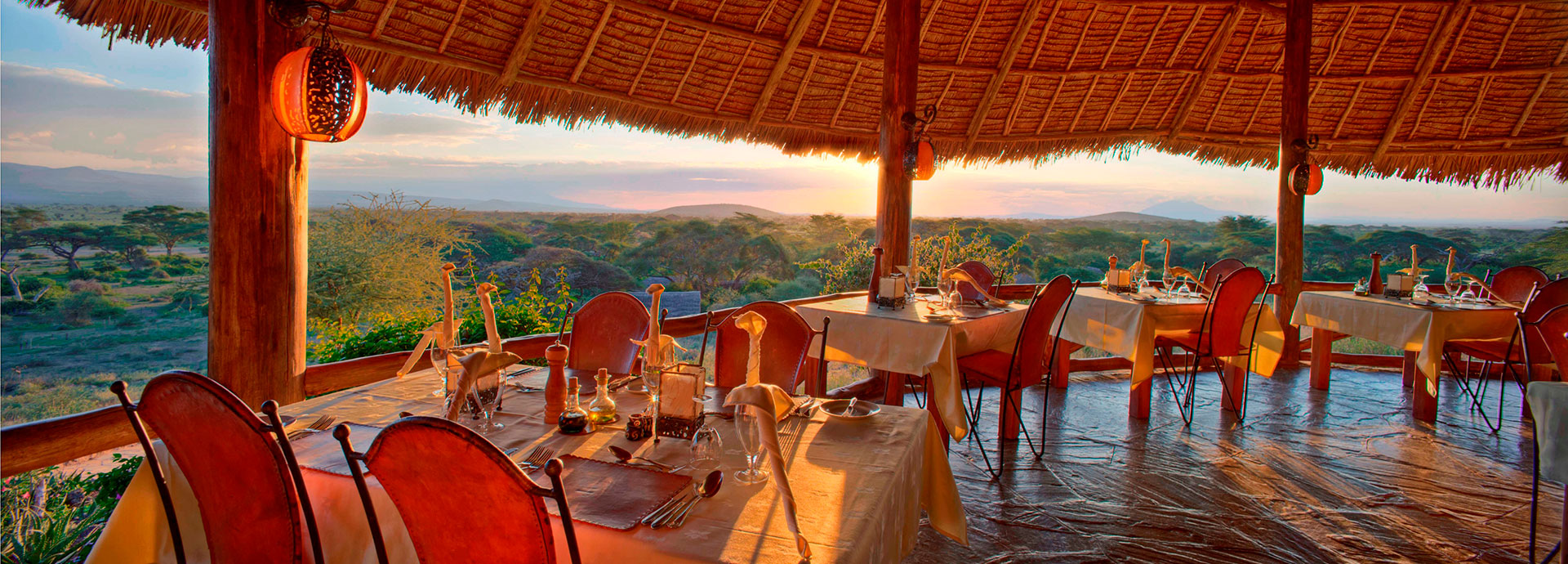 Views over the savannah and Kilimanjaro at dinner at Tortilis Camp