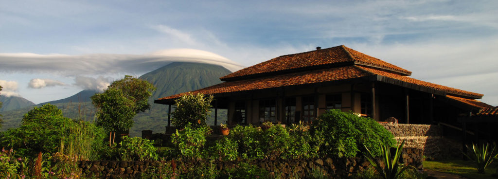Virunga Lodge is a luxury gorilla trek lodge sitting high on a ridge overlooking the Virunga Volcanoes and Lakes Bulera and Ruhondo