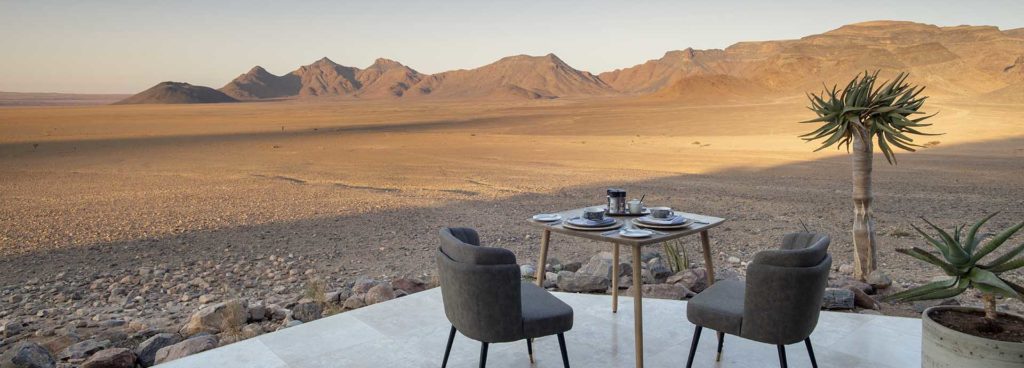 Enjoy expansive views of the Namib desert over tea at andBeyond's Sossusvlei Desert Lodge in Namibia