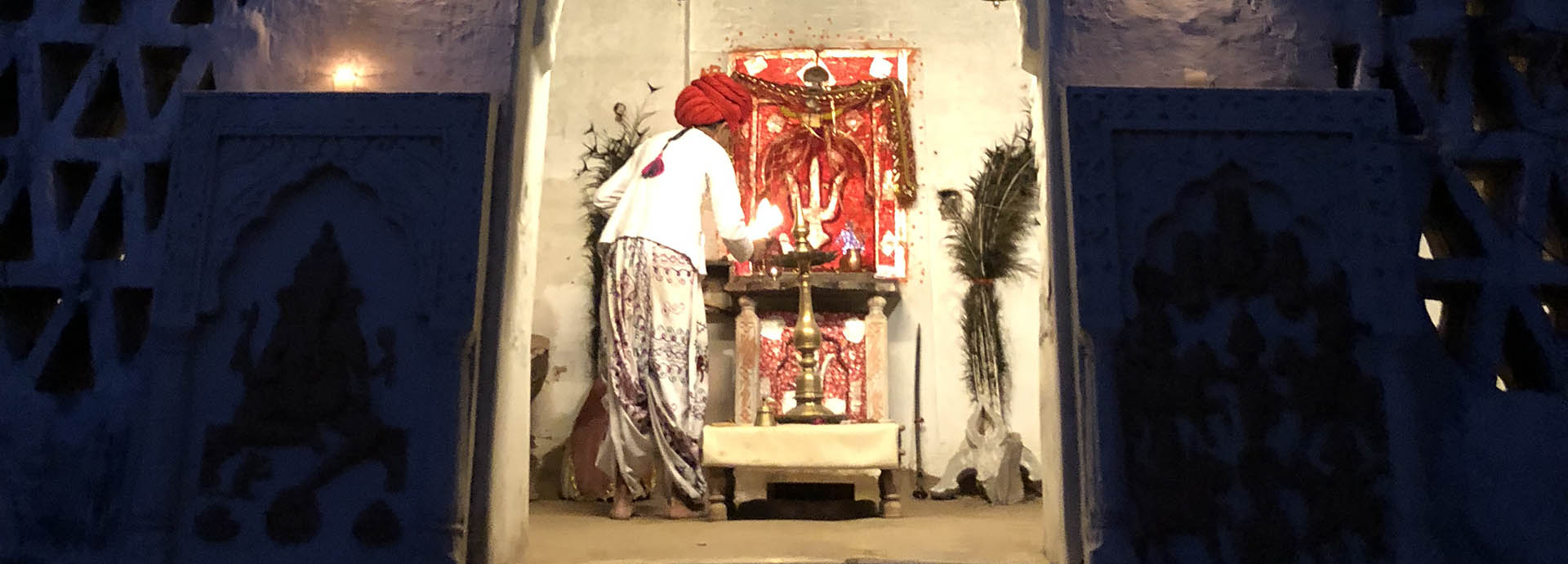 Temple and staff at Ralwa Narlai Heritage Hotel in Rajasthan