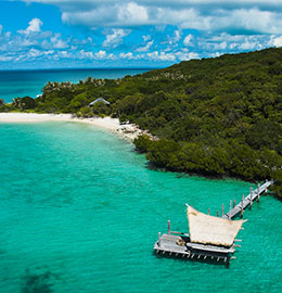 Luxurious tropical island in Australia with turquoise water and jetty lodge