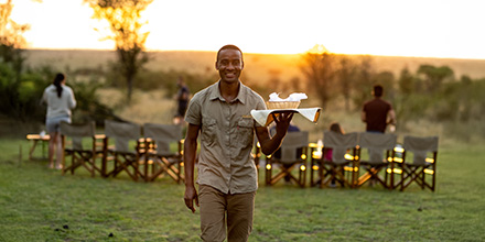 Serengeti Ndutu Kati Kati Tented Camp sundowners and waiter