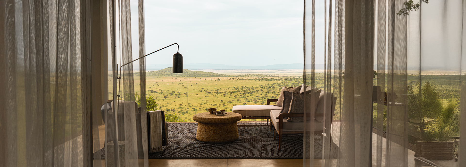 Stunning views over the Serengeti from Singita Milele luxury safari suite