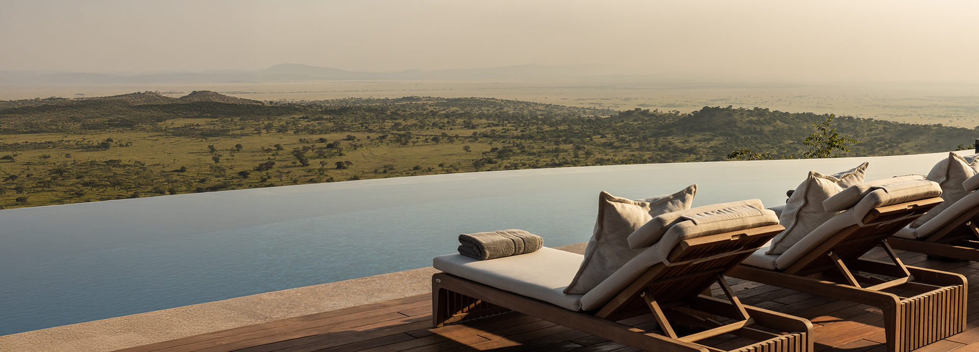 Singita Milele safari lodge infinity pool with views over Grumeti Game Reserve