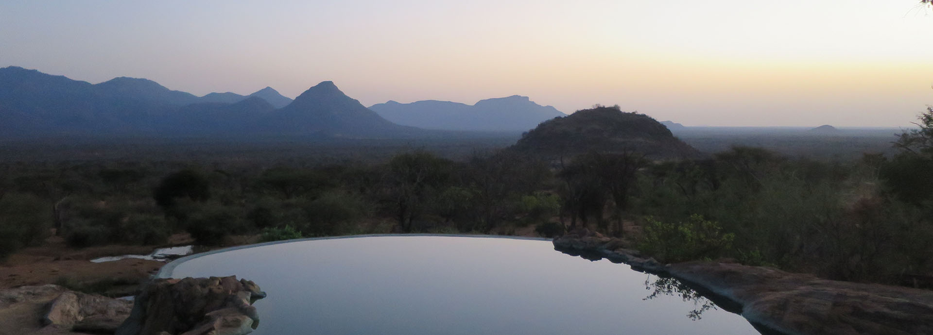 Sunset reflections by the pool at Sarara Camp with views of Samburu in Kenya
