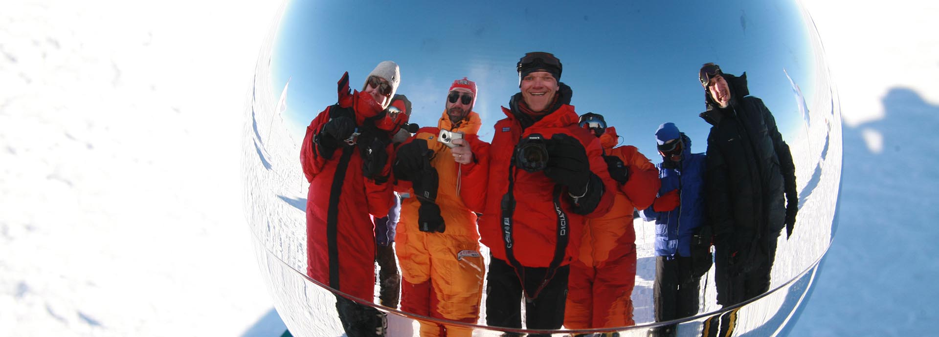 Tourists at the South Pole taking a selfie