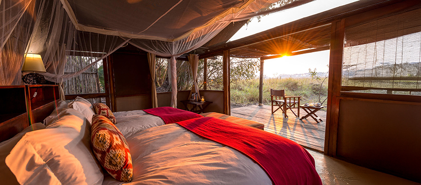 Busanga Bush Camp bedroom at sunrise