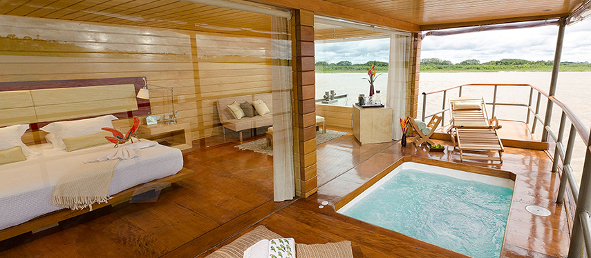 Deluxe master suite with private plunge pool aboard the Delfin I Amazon cruise
