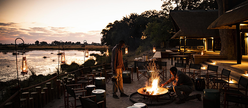 Boma and campfire at King's Pool luxury safari Camp, Botswana