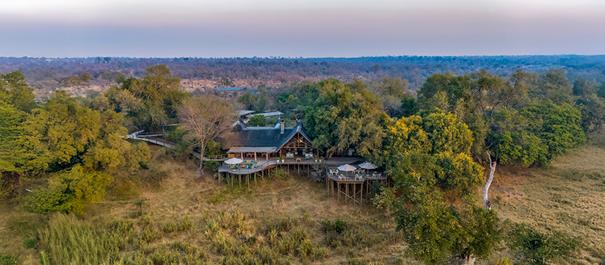 Aerial perspective of Lion Sands Narina Lodge in its pristine riverine wilderness.