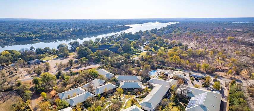 Aerial view of Insika Lodge with the Zambezi River winding through the landscape near Victoria Falls.