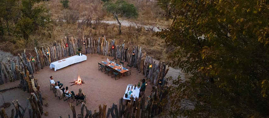 Campfire in a boma at Mankwe Tented Retreat in Botswana