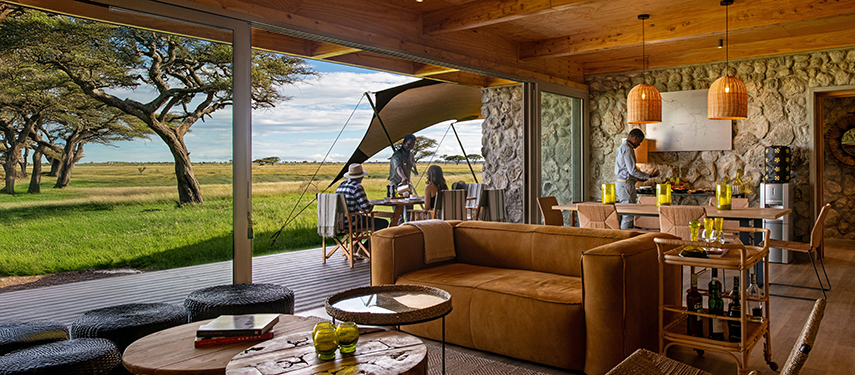 Lounge area at Namiri Plains tented camp, opening onto the wide plains of the Masai Mara, Kenya