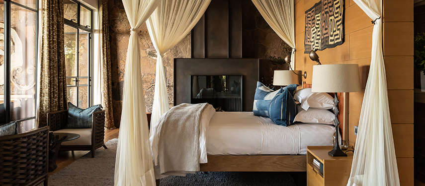 Luxurious suite at Singita Kilima private safari lodge