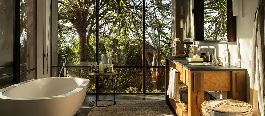 Singita Kilima luxury safari lodge en suite bathroom