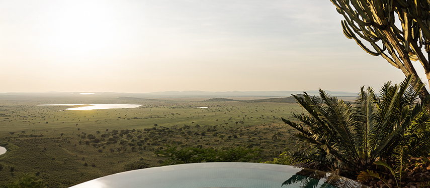 Inifinity pool at luxury safari lodge in Tanzania with views across the Serengeti