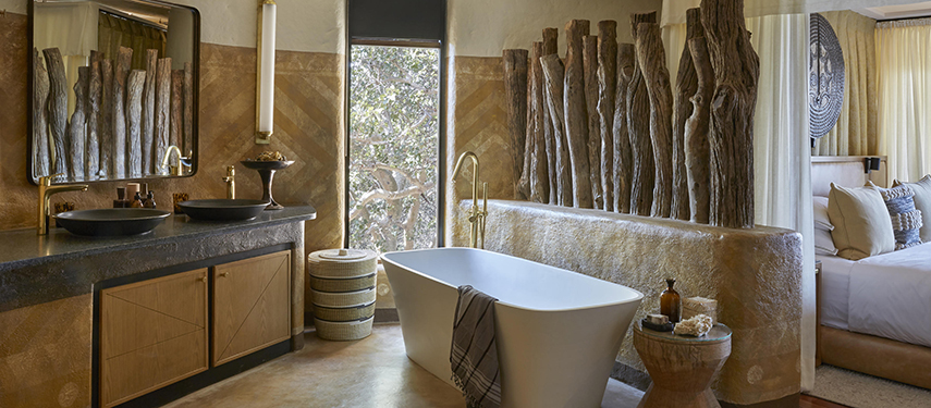 Indulgent private bathroom at Singita Malilangwe House