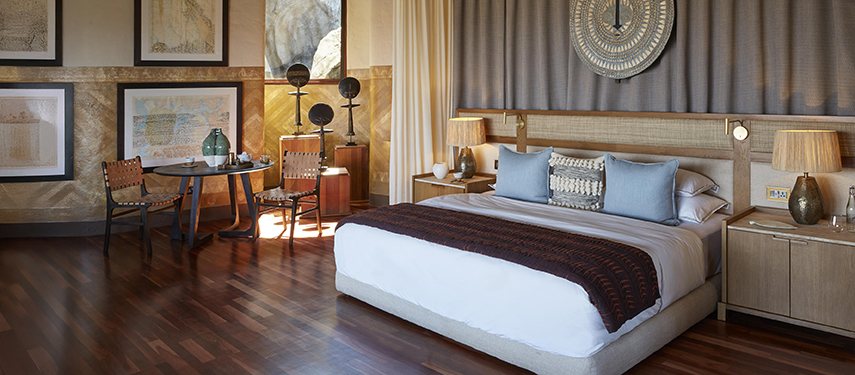 Opulent private bedroom suite at Singita Malilangwe House