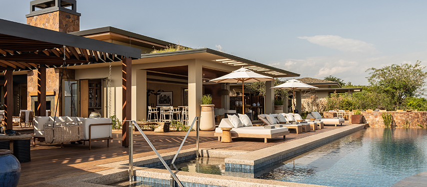 Singita Milele safari lodge infinity pool with views over Grumeti Game Reserve