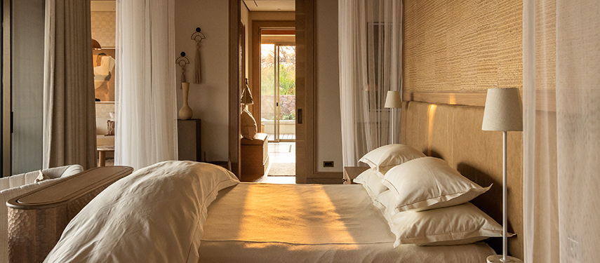 Luxurious master suite at Singita Milele safari lodge